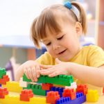 girl-playing-with-blocks